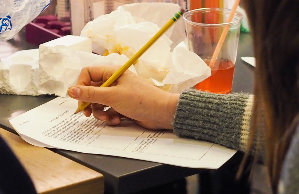 Student taking notes